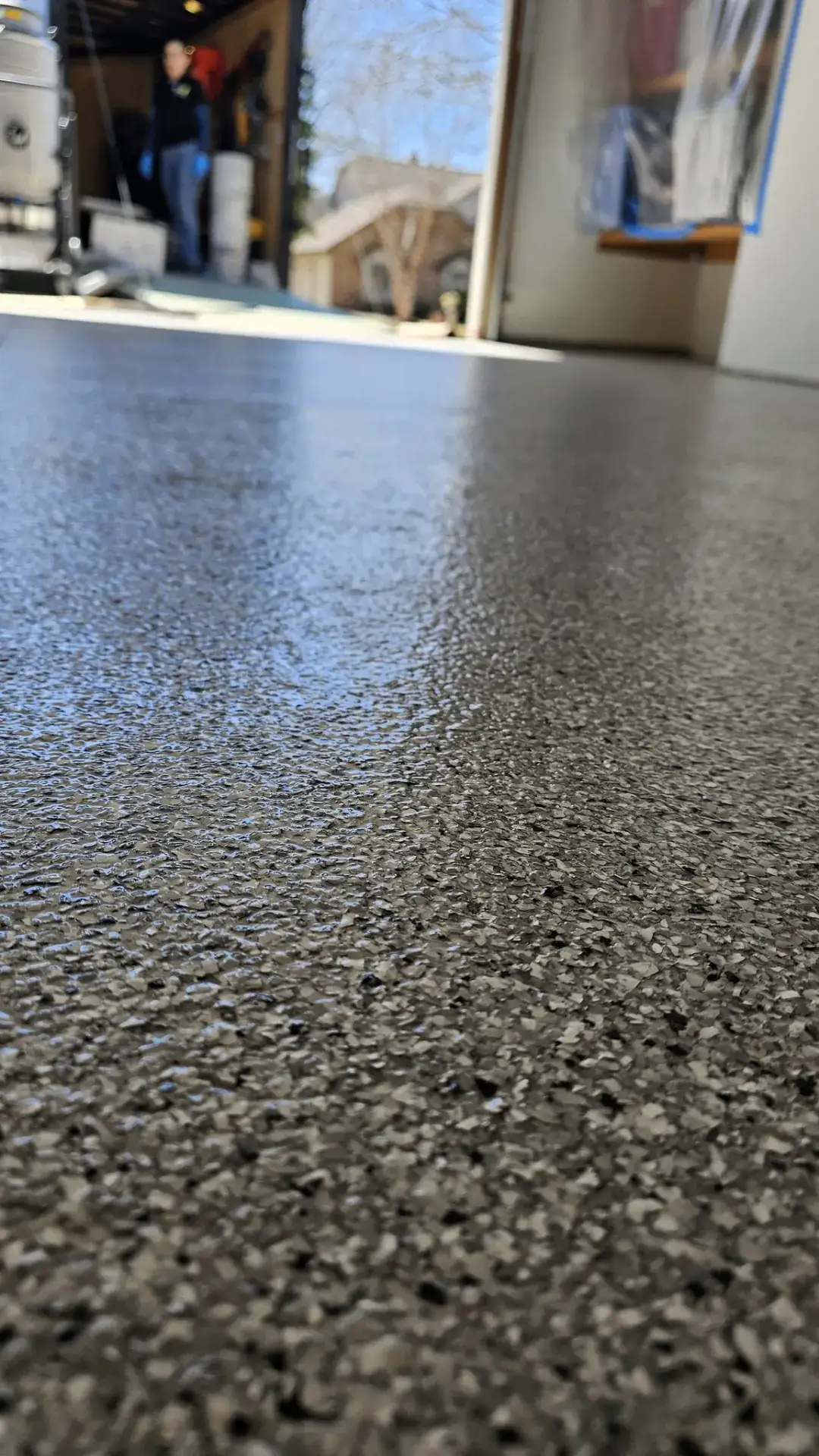 Polyaspartic top coat epoxy garage floor in Appleton, WI